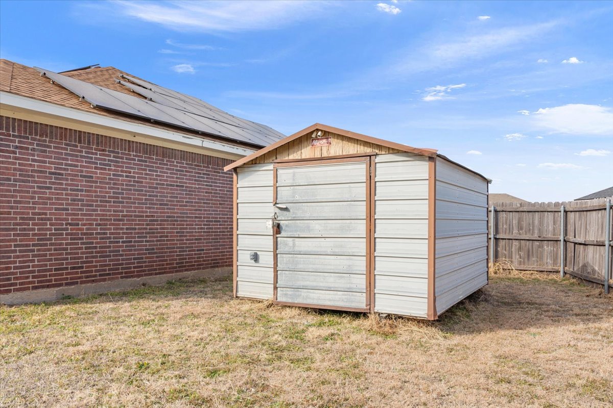 Spacious Living, a Backyard Built for Enjoyment, and Paid-Off Solar Panels,